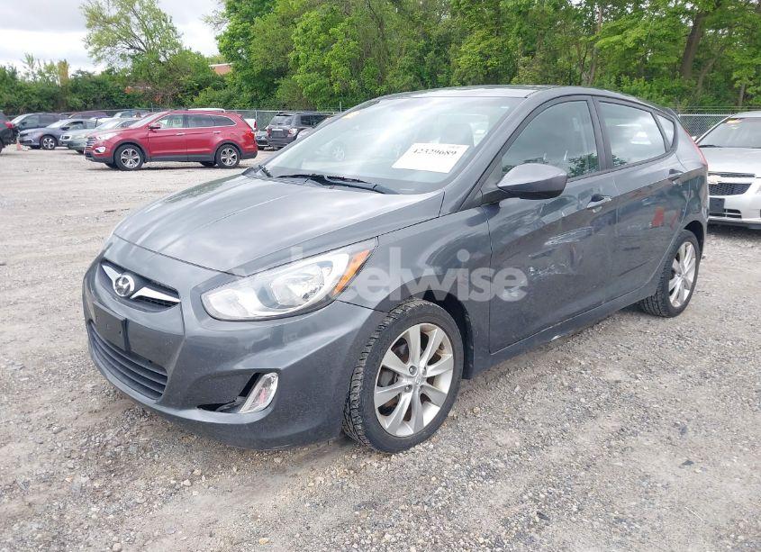 Photo 2 of 2012 Hyundai Accent SE (VIN KMHCU5AE3CU006411)