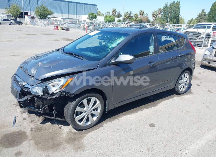 Photo 2 of 2012 Hyundai Accent SE (VIN KMHCU5AE5CU022142)