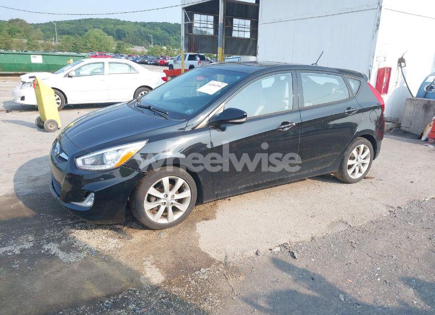 Photo 2 of 2014 Hyundai Accent SE (VIN KMHCU5AEXEU152291)