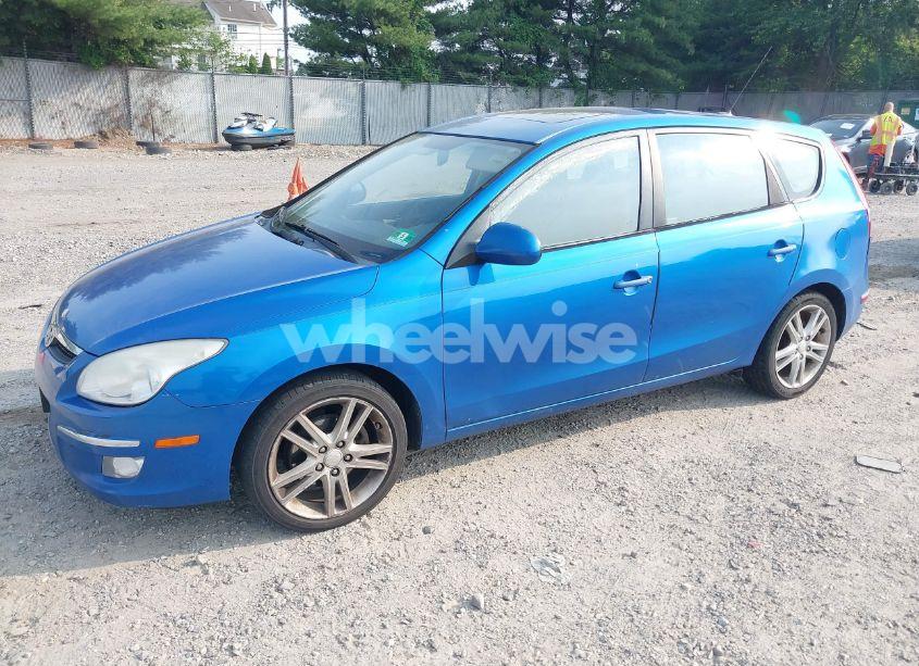 Photo 2 of 2009 Hyundai Elantra TOURING (VIN KMHDC86E29U038101)