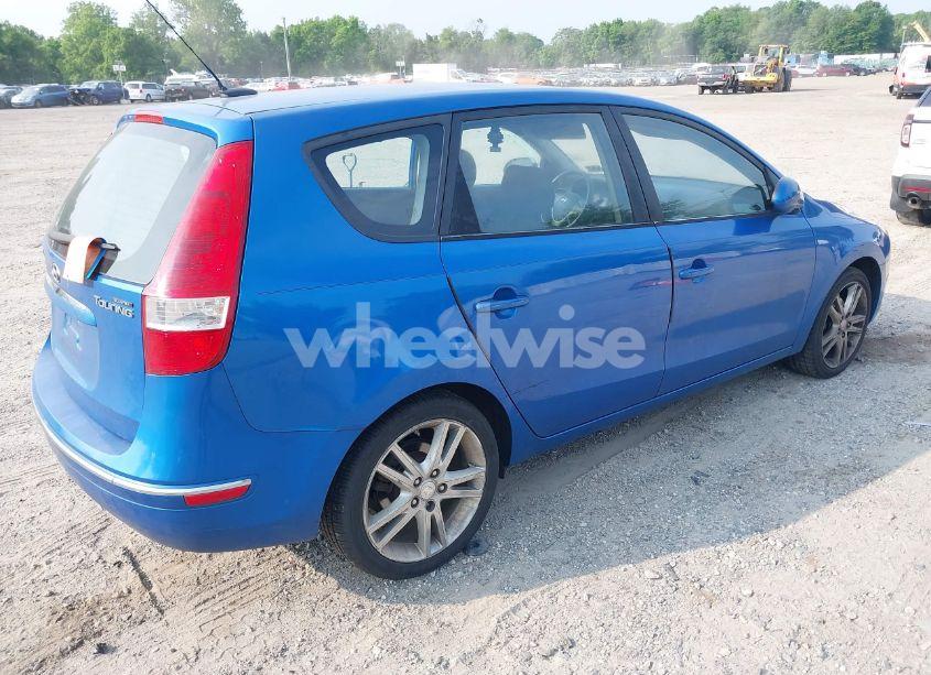 Photo 4 of 2009 Hyundai Elantra TOURING (VIN KMHDC86E29U038101)