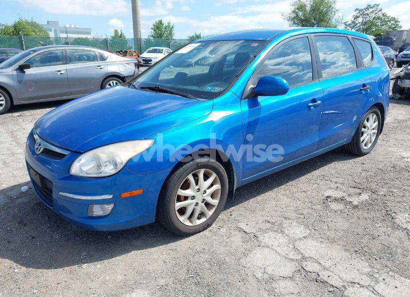 Photo 2 of 2009 Hyundai Elantra TOURING (VIN KMHDC86E39U038513)
