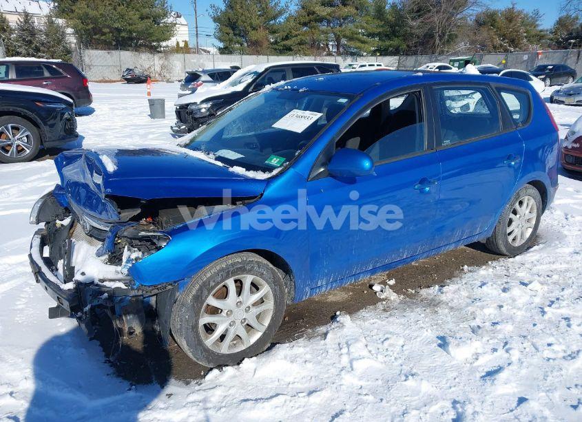 Photo 2 of 2009 Hyundai Elantra TOURING (VIN KMHDC86E39U042450)