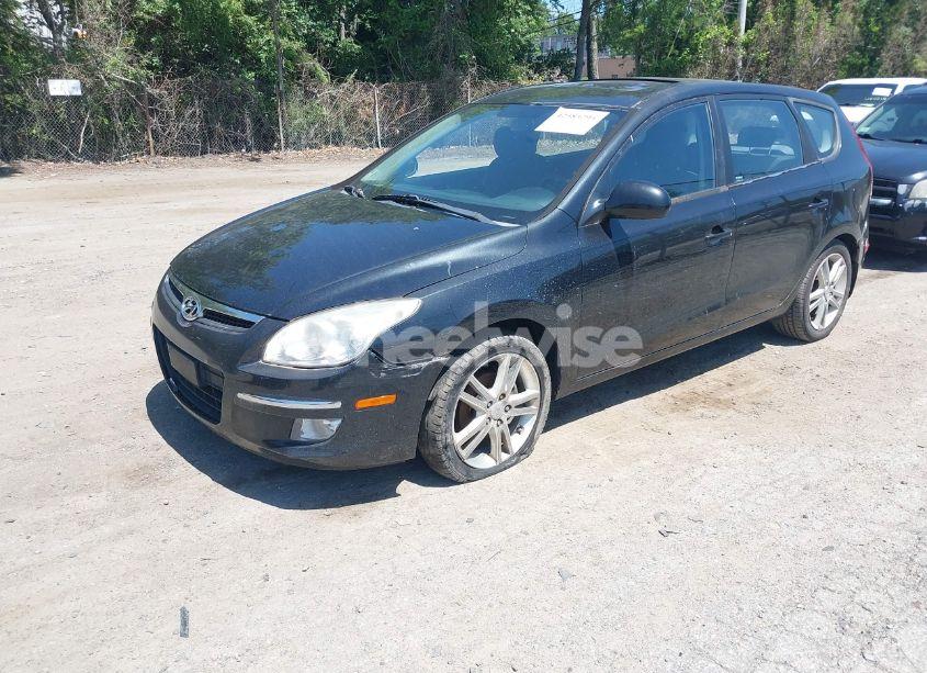 Photo 2 of 2009 Hyundai Elantra TOURING (VIN KMHDC86E79U041964)