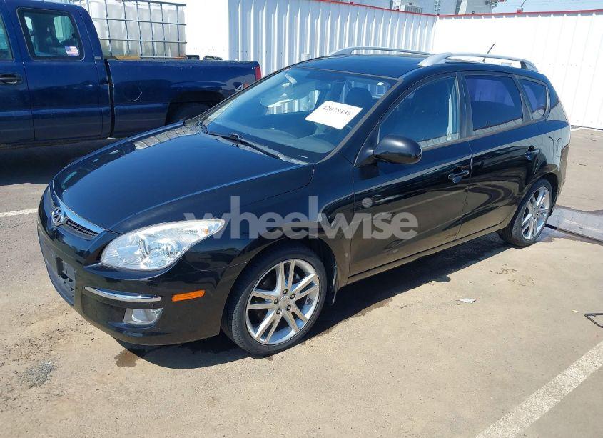 Photo 2 of 2011 Hyundai Elantra TOURING SE (VIN KMHDC8AEXBU121238)