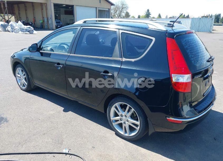 Photo 3 of 2011 Hyundai Elantra TOURING SE (VIN KMHDC8AEXBU121238)