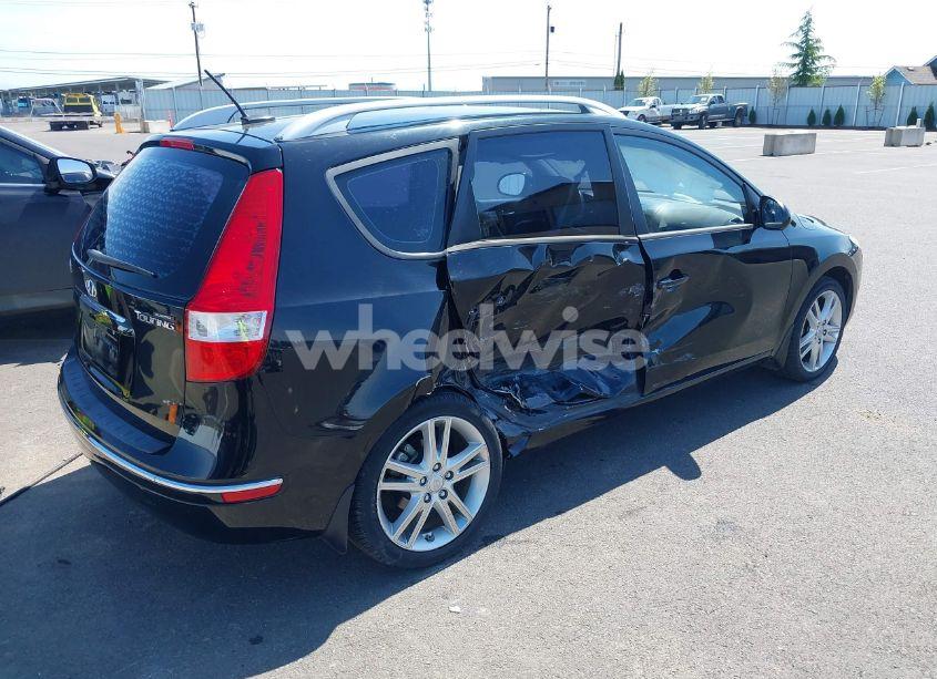 Photo 4 of 2011 Hyundai Elantra TOURING SE (VIN KMHDC8AEXBU121238)