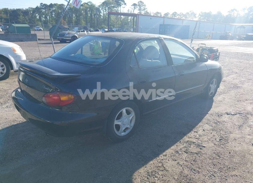 Photo 4 of 1999 Hyundai Elantra GLS (VIN KMHJF35F2XU794533)