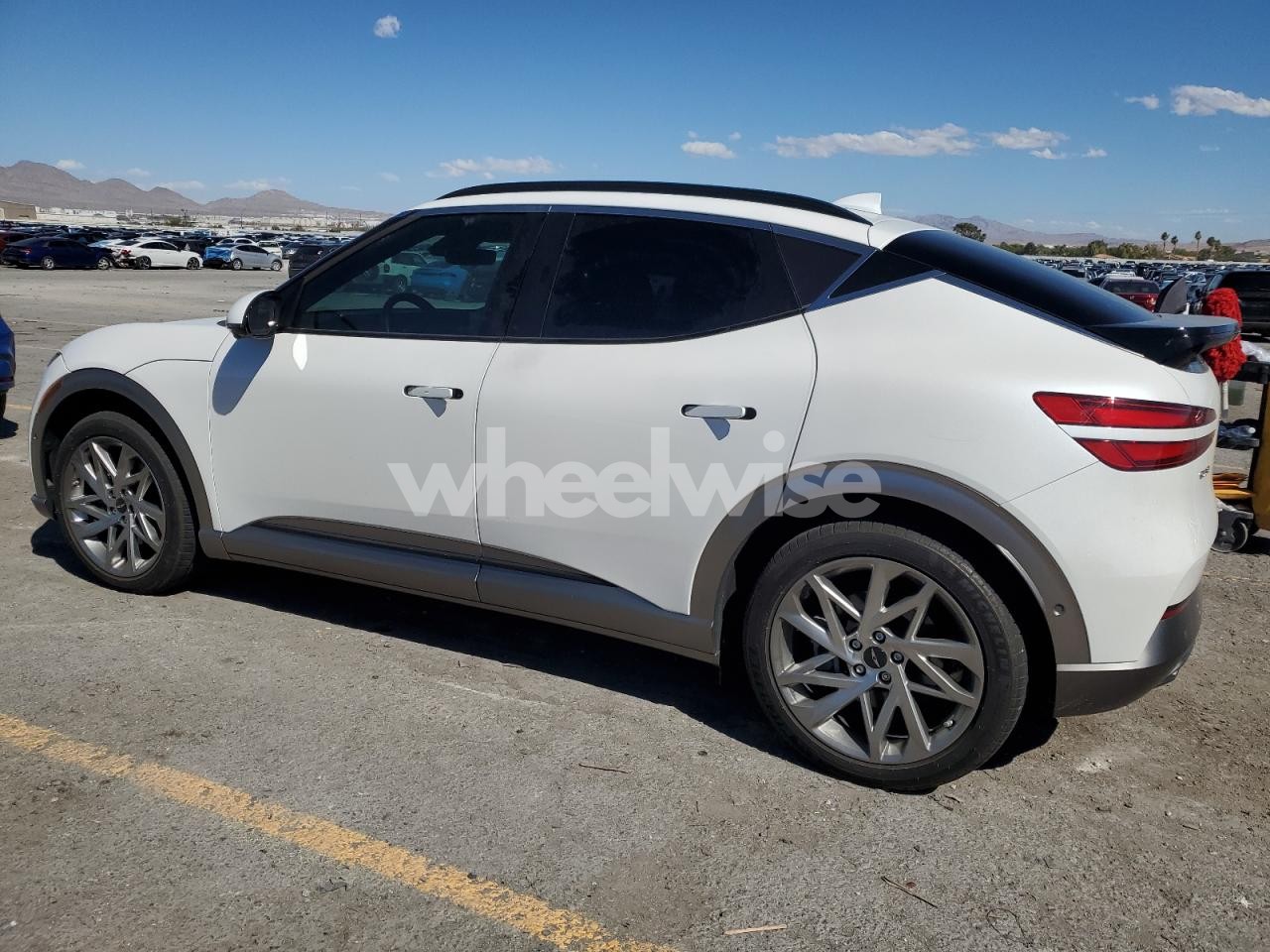 Photo 2 of 2023 GENESIS GV60 ADVANCED (VIN KMUKCDTC9PU014055)