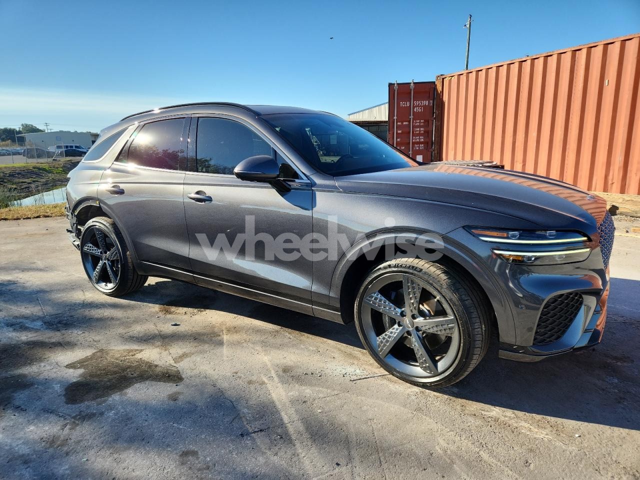 Photo 4 of 2022 GENESIS GV70 BASE (VIN KMUMCDTC3NU042620)