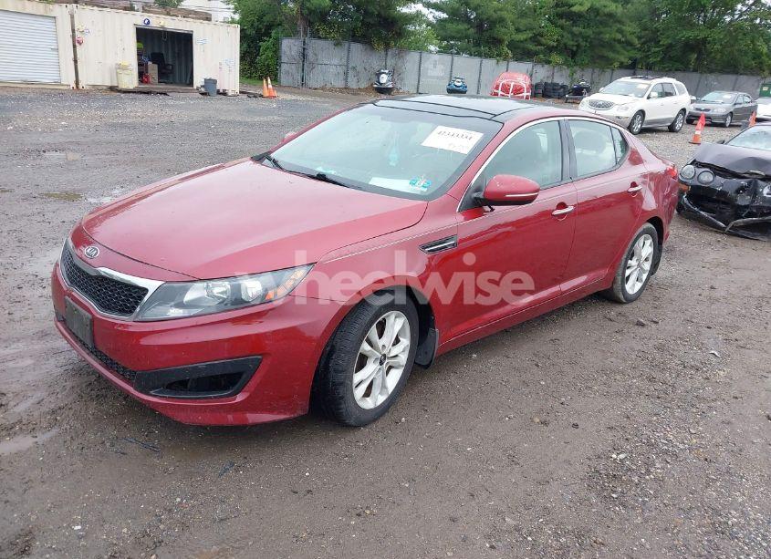 Photo 2 of 2011 Kia Optima EX (VIN KNAGN4A77B5102059)