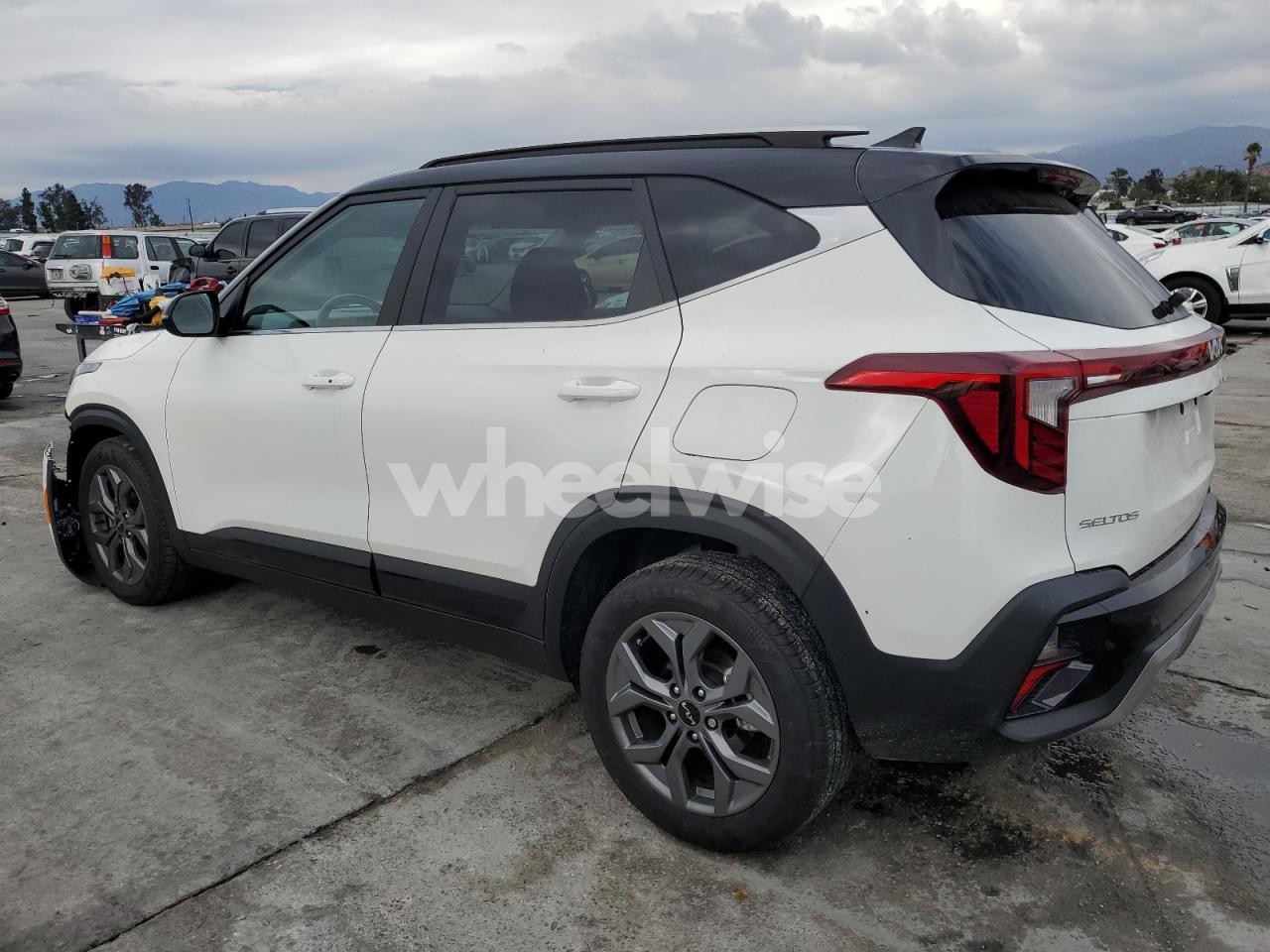 Photo 2 of 2024 KIA SELTOS S (VIN KNDEU2AAXR7614748)