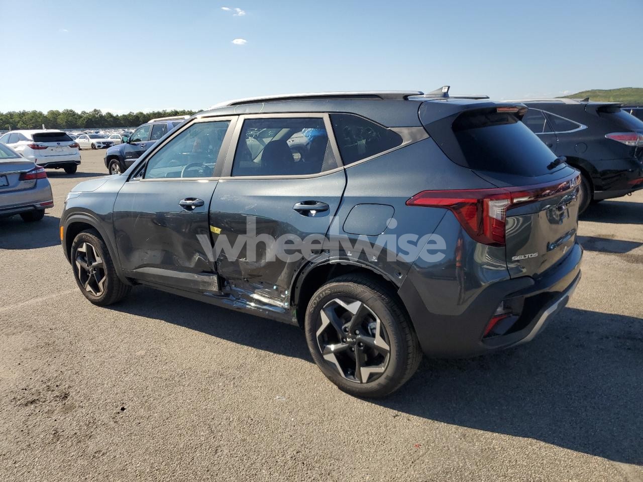 Photo 2 of 2025 KIA SELTOS S (VIN KNDEUCAA0S7795399)