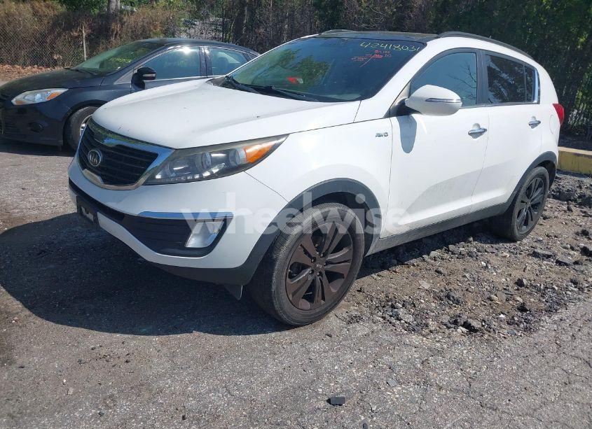 Photo 2 of 2012 Kia Sportage EX (VIN KNDPCCA24C7259982)