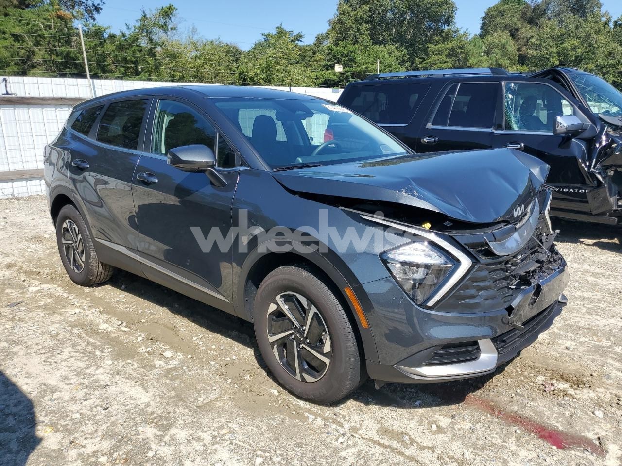 Photo 4 of 2023 KIA SPORTAGE LX (VIN KNDPUCAG8P7116922)