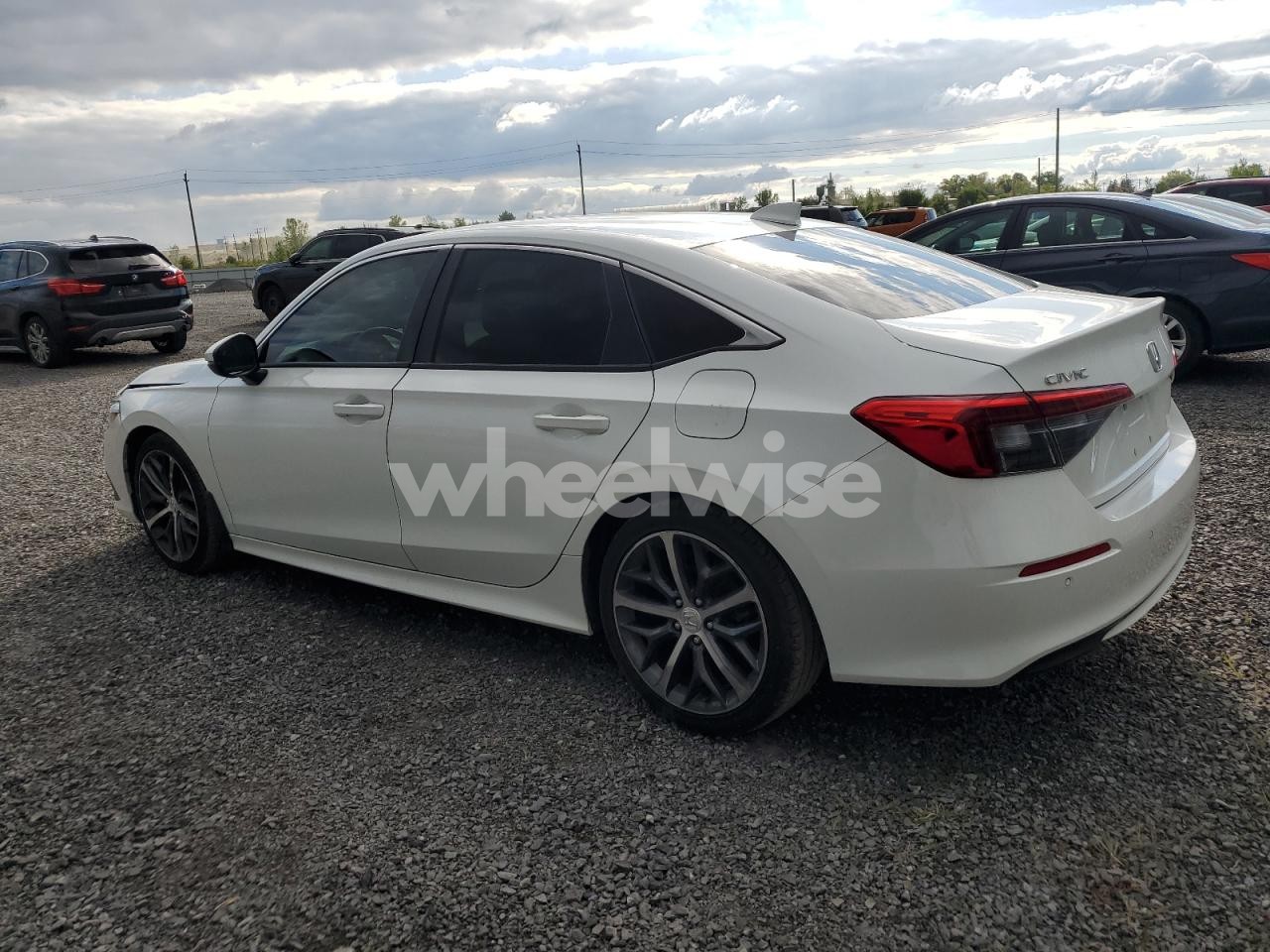 Photo 2 of 2022 HONDA CIVIC TOURING (VIN MAJ6P1CL0JC165795)