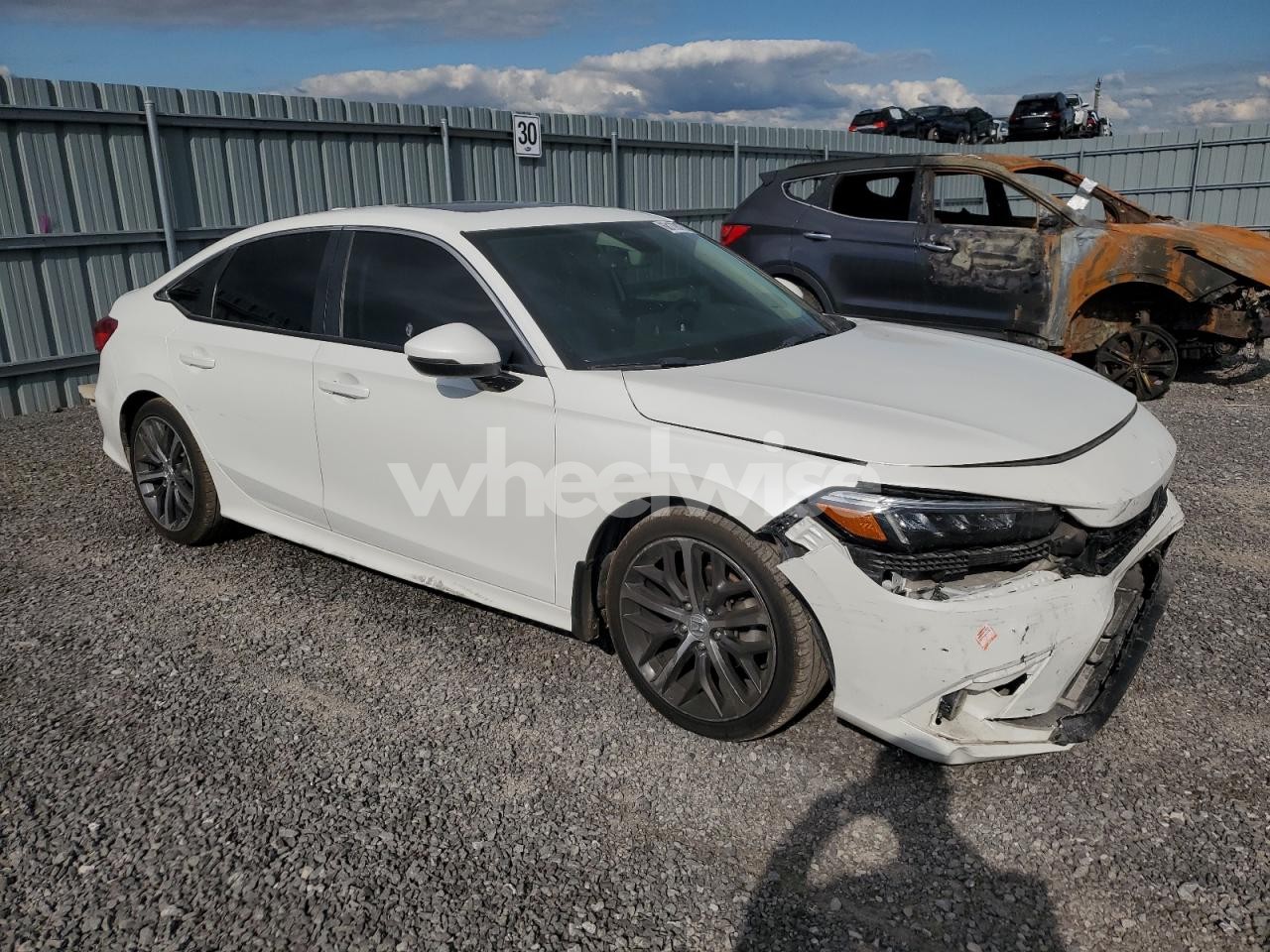 Photo 4 of 2022 HONDA CIVIC TOURING (VIN MAJ6P1CL0JC165795)