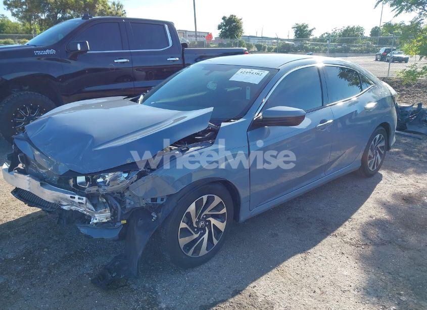 Photo 2 of 2018 Honda Civic LX (VIN SHHFK7H25JU232923)