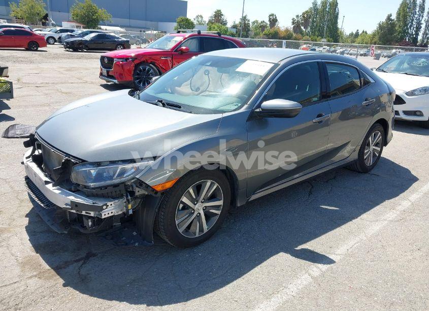 Photo 2 of 2020 Honda Civic LX (VIN SHHFK7H32LU414932)