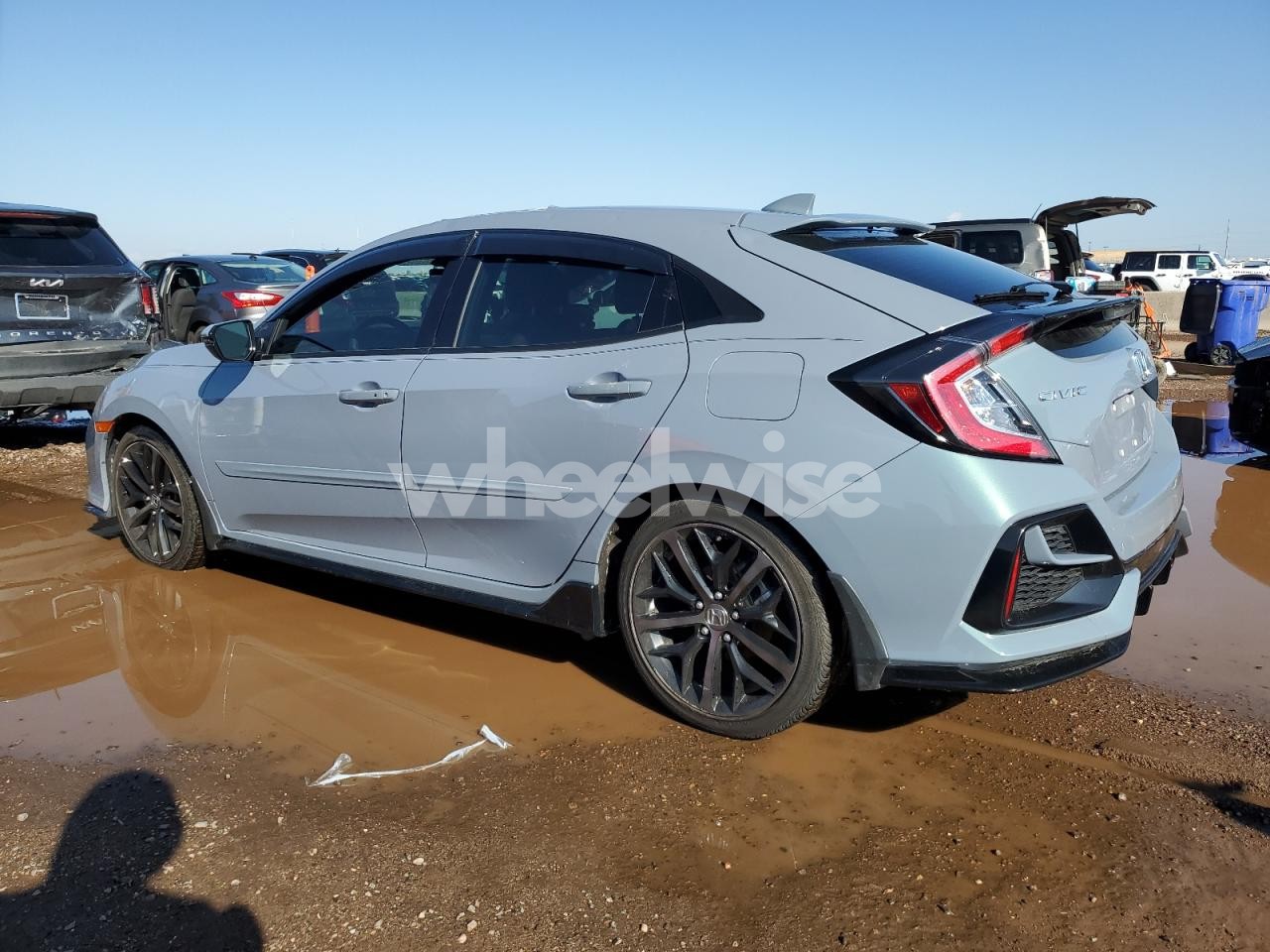 Photo 2 of 2020 HONDA CIVIC SPORT TOURING (VIN SHHFK7H93LU209933)