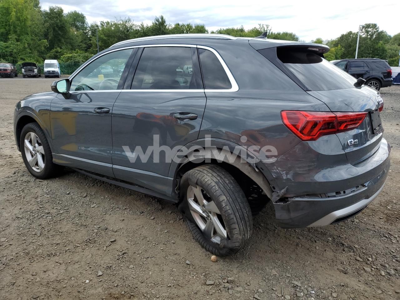 Photo 2 of 2020 AUDI Q3 PREMIUM PLUS (VIN WA1BECF36L1103557)