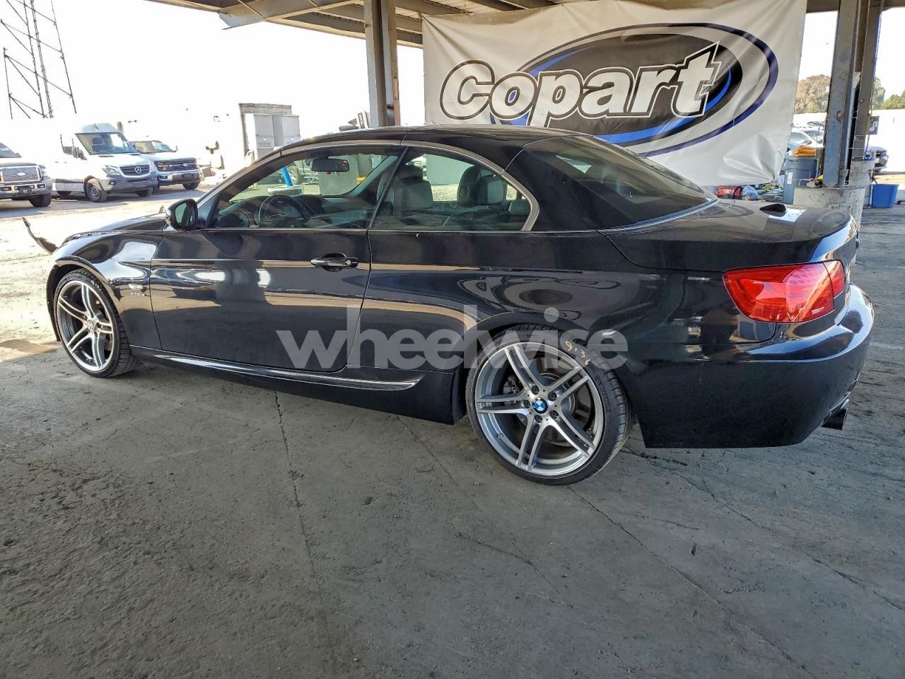 Photo 2 of 2011 BMW 335 IS (VIN WBADX1C51BE569856)