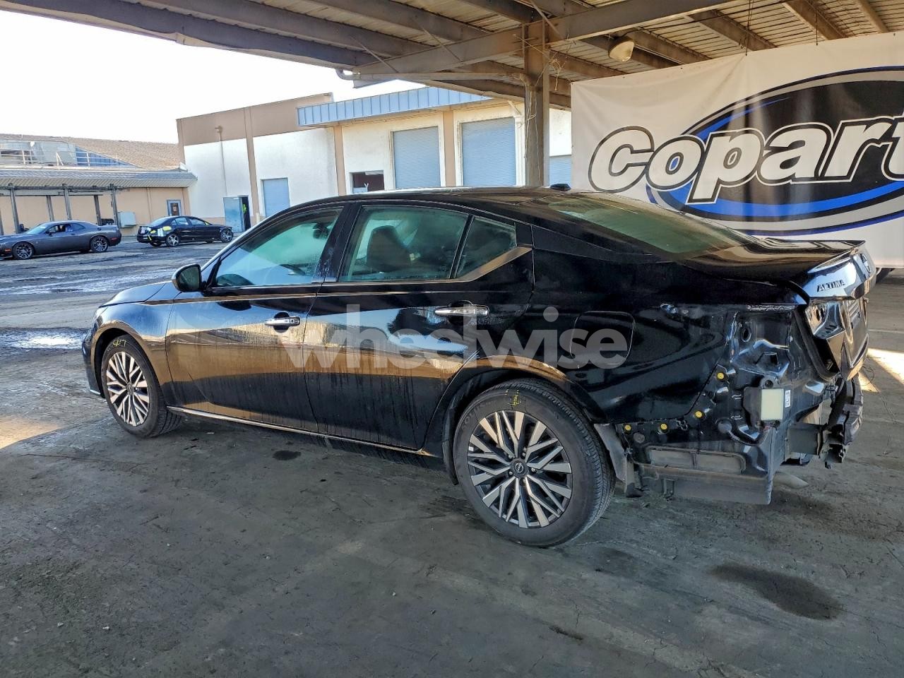 Photo 2 of 2025 NISSAN ALTIMA SV (VIN WBAFU7C5XBC780473)