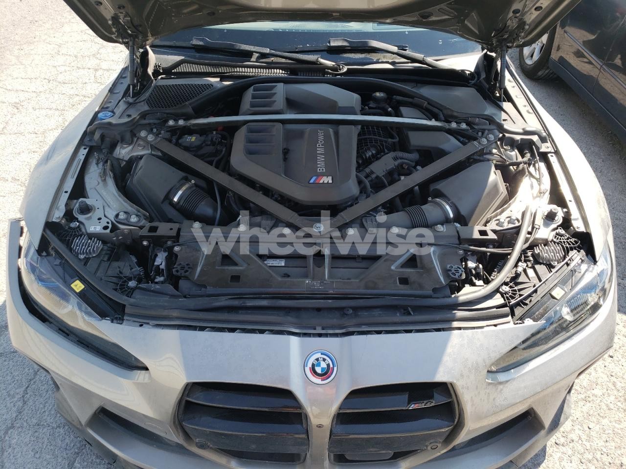 Photo 11 of 2022 BMW M4 COMPETITION (VIN WBS43AZ01NCK66403)