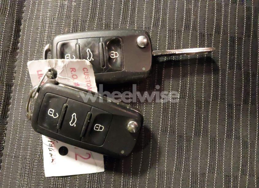 Photo 11 of 2014 Volkswagen Tiguan S (VIN WVGAV3AX9EW614094)