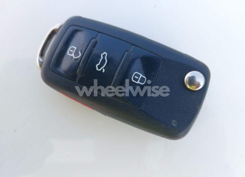 Photo 11 of 2012 Volkswagen Tiguan SE (VIN WVGAV7AX5CW544968)