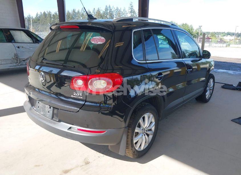 Photo 4 of 2011 Volkswagen Tiguan SE (VIN WVGBV7AX3BW557852)