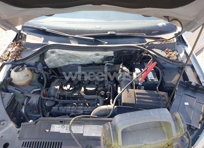 Photo 10 of 2012 Volkswagen Tiguan SEL (VIN WVGBV7AX3CW604086)