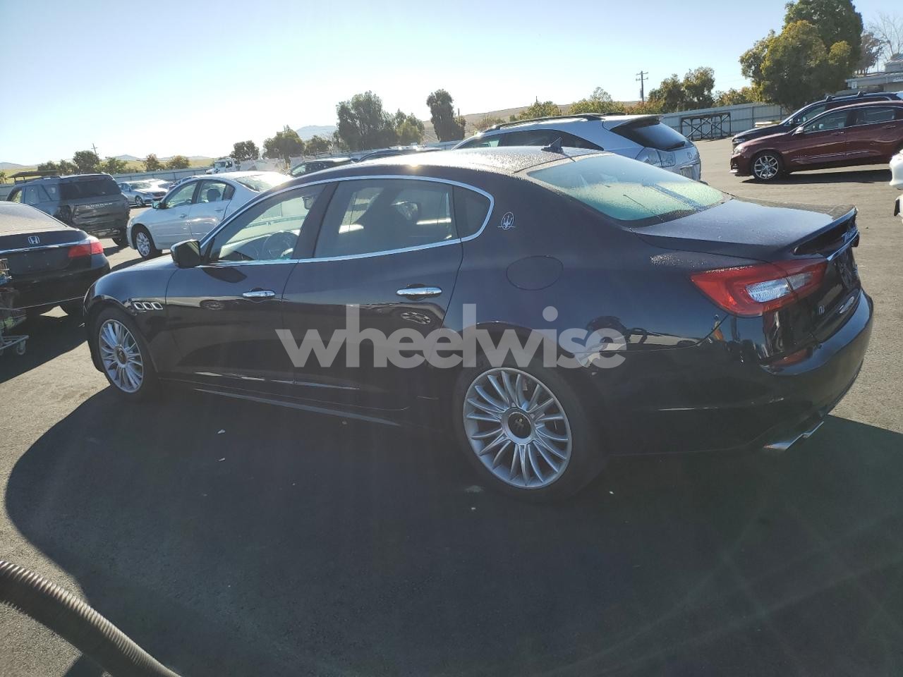 Photo 2 of 2014 MASERATI QUATTROPORTE S (VIN ZAM56RRA8E1091407)