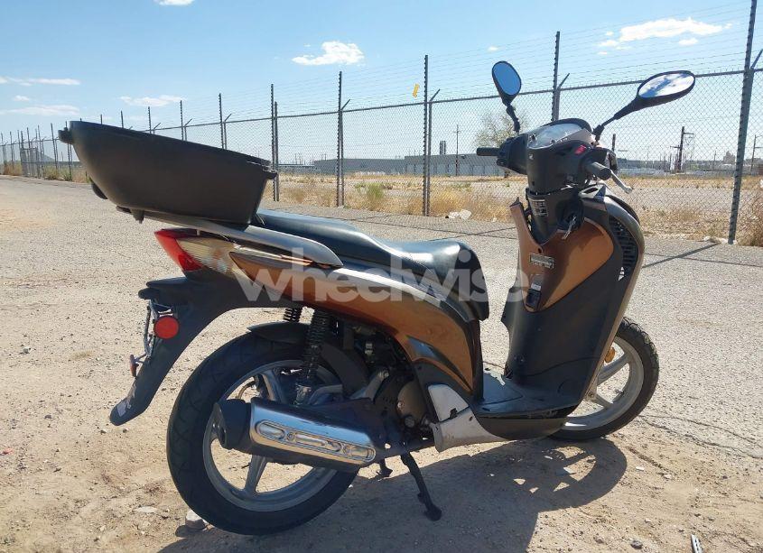 Photo 4 of 2010 Honda Sh150 D (VIN ZDCKF1012AF002930)