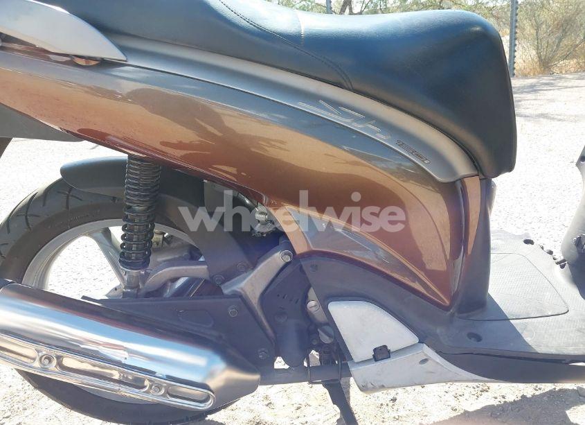 Photo 8 of 2010 Honda Sh150 D (VIN ZDCKF1012AF002930)