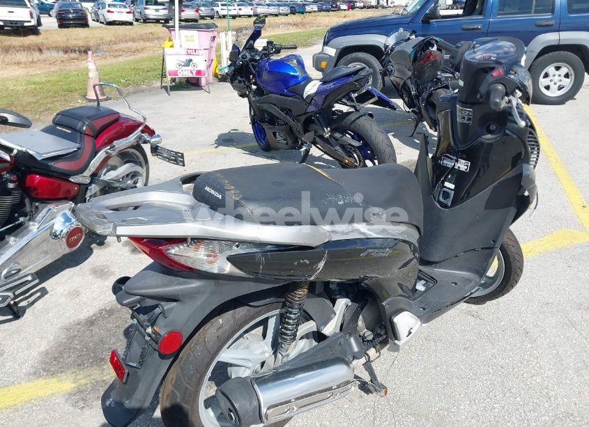 Photo 4 of 2010 Honda Sh150 D (VIN ZDCKF1015AF003053)